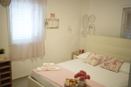Ένα ή περισσότερα κρεβάτια σε δωμάτιο στο MYS Luxury Apartment