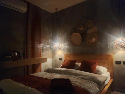 Un ou plusieurs lits dans un hébergement de l'établissement Haraja Boutique Resort