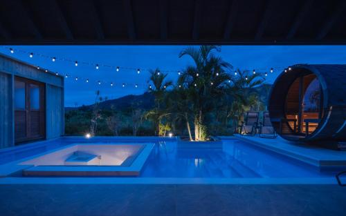 Bazén v ubytování Reflexion Villas GLANZ by Relapool nebo v jeho okolí