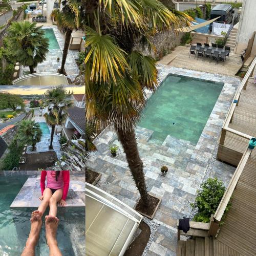 une femme est assise au bord d'une piscine dans l'établissement L'Hématite, aux Épesses