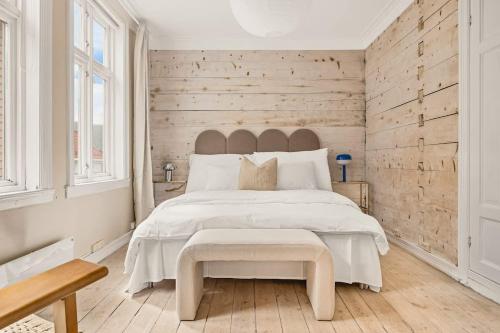 Katil atau katil-katil dalam bilik di DINBNB Apartments l The 1880 Authentic Bergen Dream I 500m to Bryggen