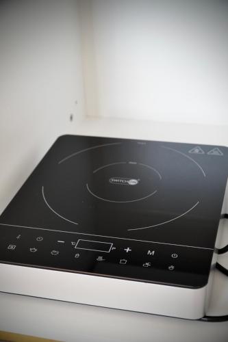 a close up of a toaster oven at Ludovic Luxury Suite in Bucharest