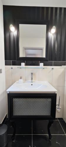 Ένα μπάνιο στο Willa Jaśmin Domki, Apartamenty, Pokoje nad morzem