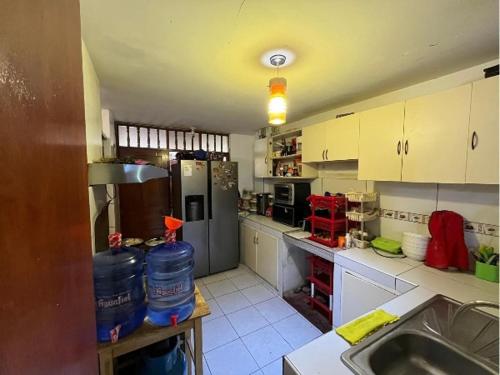 Kuchyň nebo kuchyňský kout v ubytování CASA Hospedaje en Trujillo