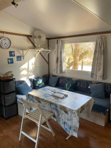 Posezení v ubytování Bungalow tout confort
