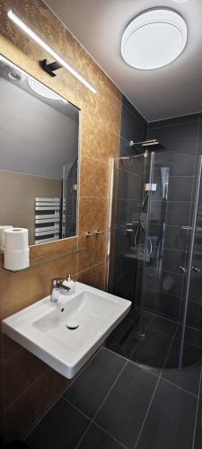 Ένα μπάνιο στο Willa Jaśmin Domki, Apartamenty, Pokoje nad morzem