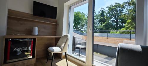 Η κουζίνα ή μικρή κουζίνα στο Willa Jaśmin Domki, Apartamenty, Pokoje nad morzem