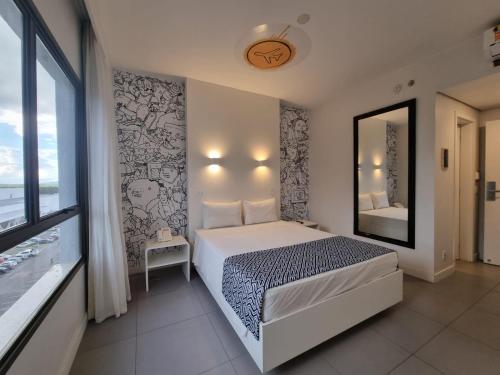 Ένα ή περισσότερα κρεβάτια σε δωμάτιο στο ibis Styles Boa Vista