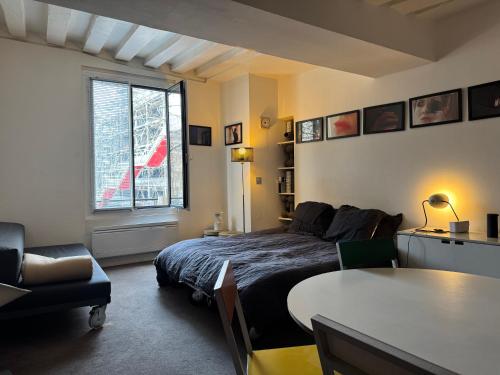 Suite indépendante studio top centre Marais