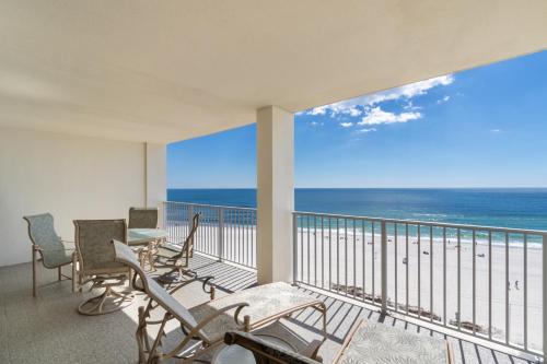 a balcony with chairs and a view of the ocean at Windward Pointe Condominiums in Orange Beach