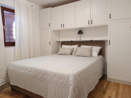 Posteľ alebo postele v izbe v ubytovaní Apartment Antišin