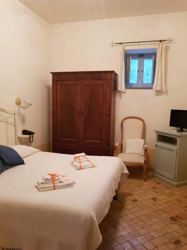 Una cama o camas en una habitación de Il Delfino