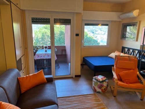 a living room with a couch and a table at Loggia Portofino 2 in Rapallo