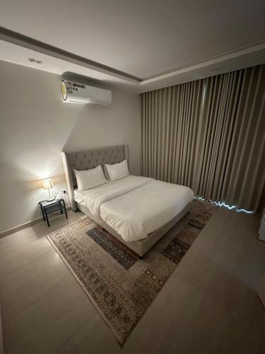 Katil atau katil-katil dalam bilik di Self-entry Apartment