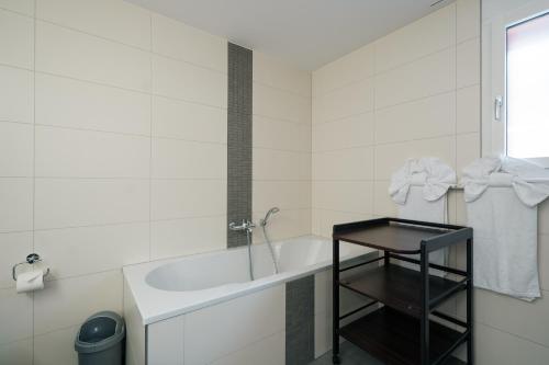 Vannituba majutusasutuses Apartment Elona