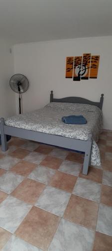 Una cama o camas en una habitación de Complejo Juli dpto TUCCI