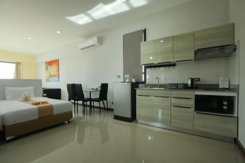 Dapur atau dapur kecil di Blue Beach Apartment