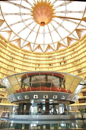 a large building with a domed ceiling at Rajhans belliza in Surat