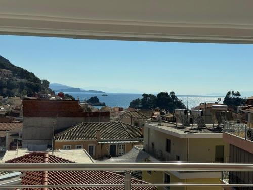 a view of a city from a window at Villa Antonis in Parga