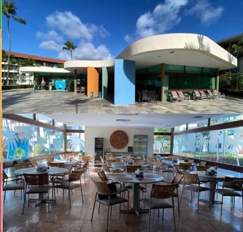 ein Restaurant mit Tischen und Stühlen vor einem Gebäude in der Unterkunft Marulhos Resort by HomeTemp in Porto De Galinhas
