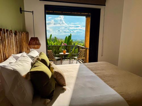 Tukki Ecolodge Hotelにあるベッド