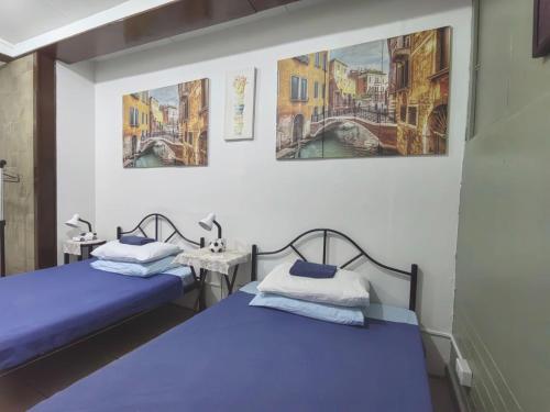 Voodi või voodid majutusasutuse Nappers Hostel toas