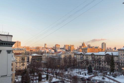 a view of a city in the snow at Idea Design Apart-Hotel Prorizna in Kyiv