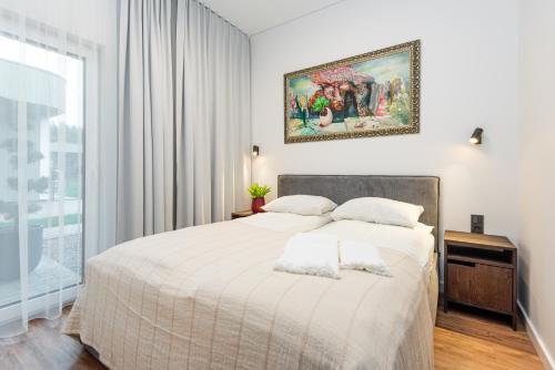 Ένα ή περισσότερα κρεβάτια σε δωμάτιο στο Vila Barbora 1