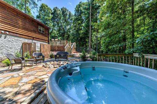 a hot tub in a yard with a patio at Hidden Pond by Carolina Mornings in Juno