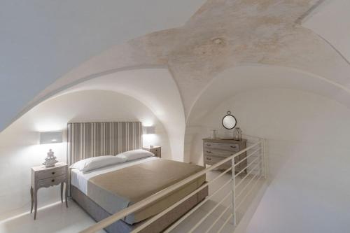 Ένα ή περισσότερα κρεβάτια σε δωμάτιο στο Casina Bellanova