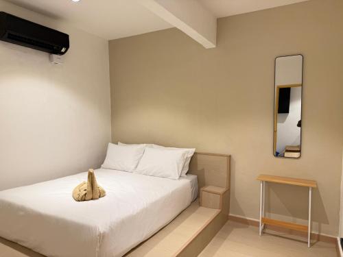 Postel nebo postele na pokoji v ubytování SWM Hotel