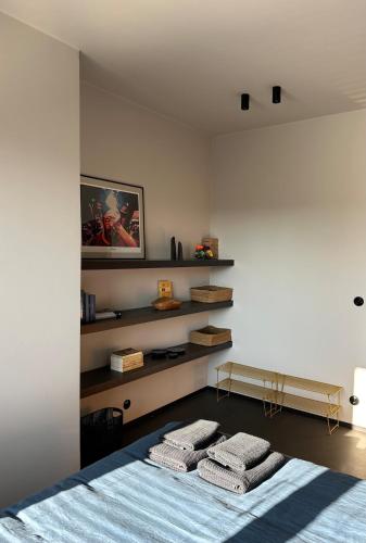 Una cama o camas en una habitación de Zalig HASPENGOUW