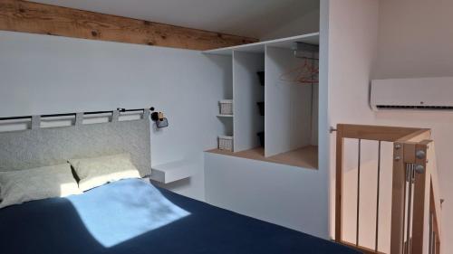 Postel nebo postele na pokoji v ubytování Mazet provençal sous les chênes