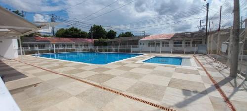 an image of a swimming pool in a house at Casa en conjunto Flandes 3 Habitaciones in Flandes