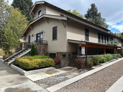 a house with a porch and stairs to it at The Church, Built in 1923 & 2 Blocks From Downtown in Bend