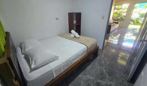 Ein Bett oder Betten in einem Zimmer der Unterkunft Hostel Cattleya - Monteverde, Costa Rica