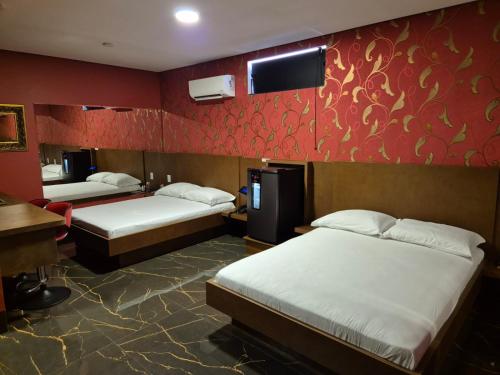 Katil atau katil-katil dalam bilik di Tantra Motel