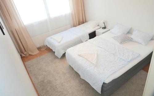 Postel nebo postele na pokoji v ubytování Spacious City Retreat with Private Sauna