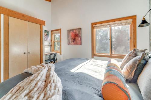a bedroom with a bed and a window at 8 Mi to Lake Tahoe Spacious Northstar Condo! in Truckee