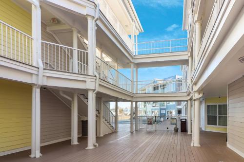 a view of the inside of a building with stairs at Sunset Bay Villa 116 - Waterfront with shared pool! in Chincoteague