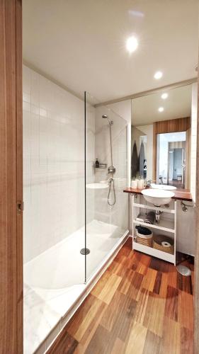 a bathroom with a shower and a sink at Desconectaengalicia Rincón de Cabodeiro in Isla de Arosa