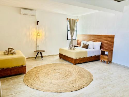 Postel nebo postele na pokoji v ubytování Digital Nomads Hotel & CoLiving