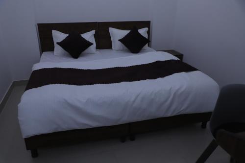 Ένα ή περισσότερα κρεβάτια σε δωμάτιο στο Hotel Comfort Inn