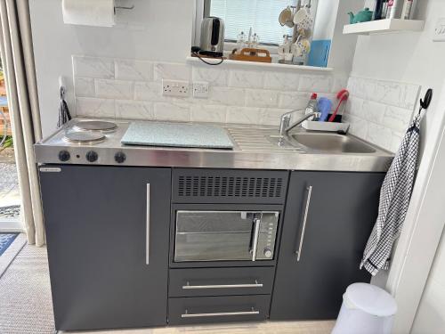 Una cocina o cocineta en Garden Studio in Bourne End