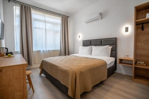 Ένα ή περισσότερα κρεβάτια σε δωμάτιο στο Antalya D&D Garden