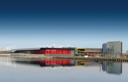 a stadium sitting next to a body of water at London Dockside 3 Bed in London