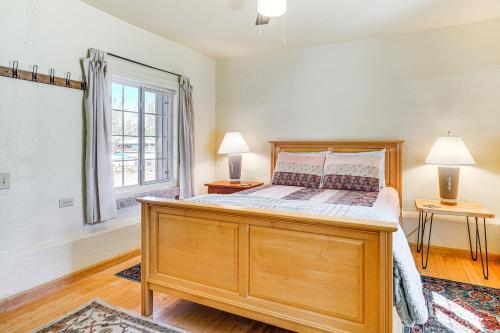 a bedroom with a large bed and a window at Peaceful and Historic Home in Patagonia! in Patagonia