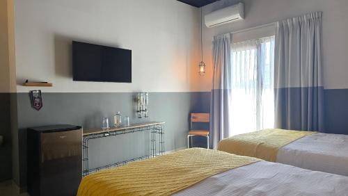 Cama ou camas em um quarto em Hotel NEXT