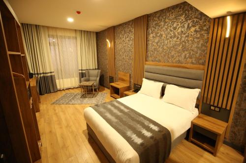 Katil atau katil-katil dalam bilik di Büpa delüxe hotel