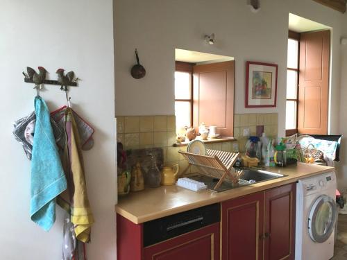 Køkken eller tekøkken på Charmante ferme vue exceptionnelle 10 voyageurs